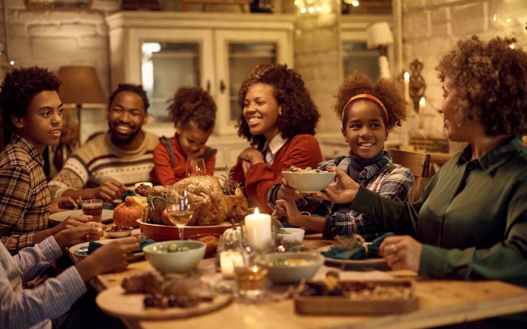 Manna from Heaven photo to show African American family eating Thanksgiving dinner.