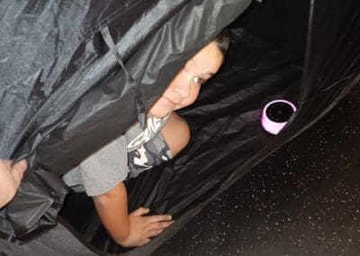 Boy in sensory tent at Christ Chapel Church.